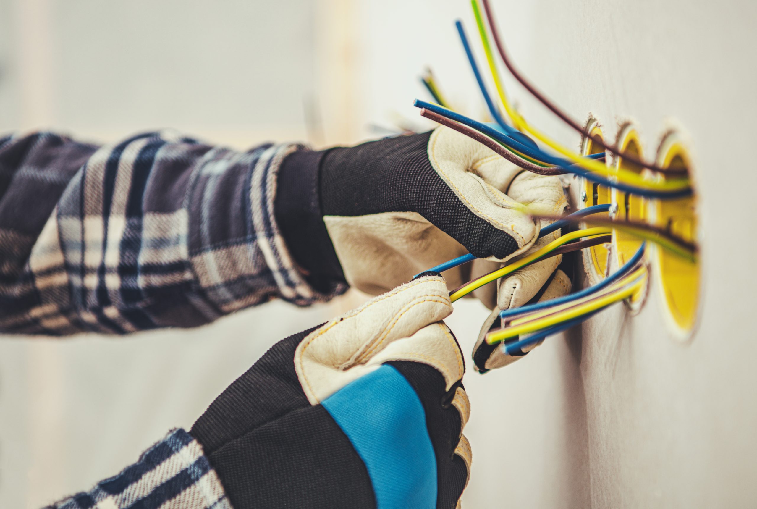 Electrician Working With Wires Background Image